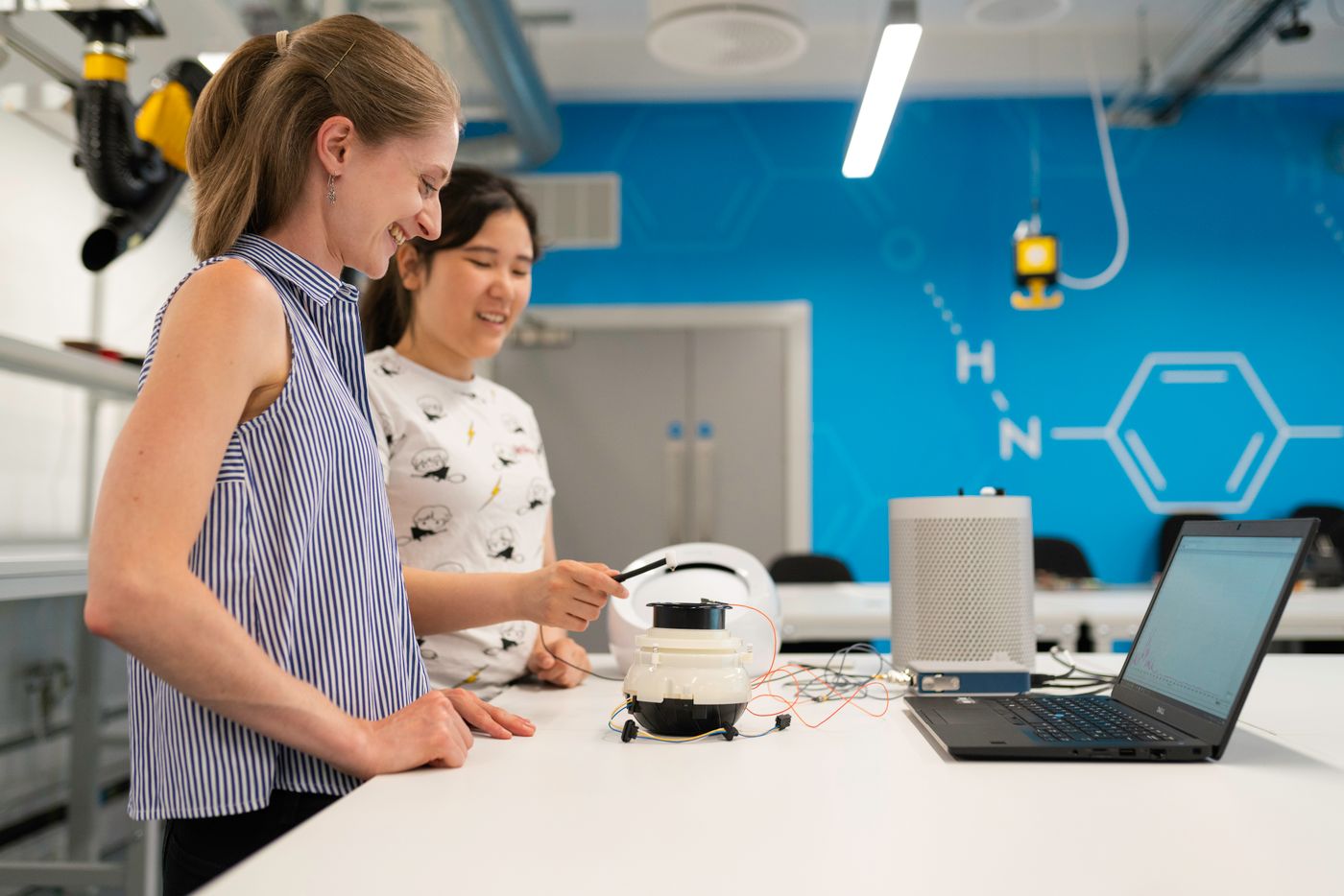 Aerospace and robotics engineers at work